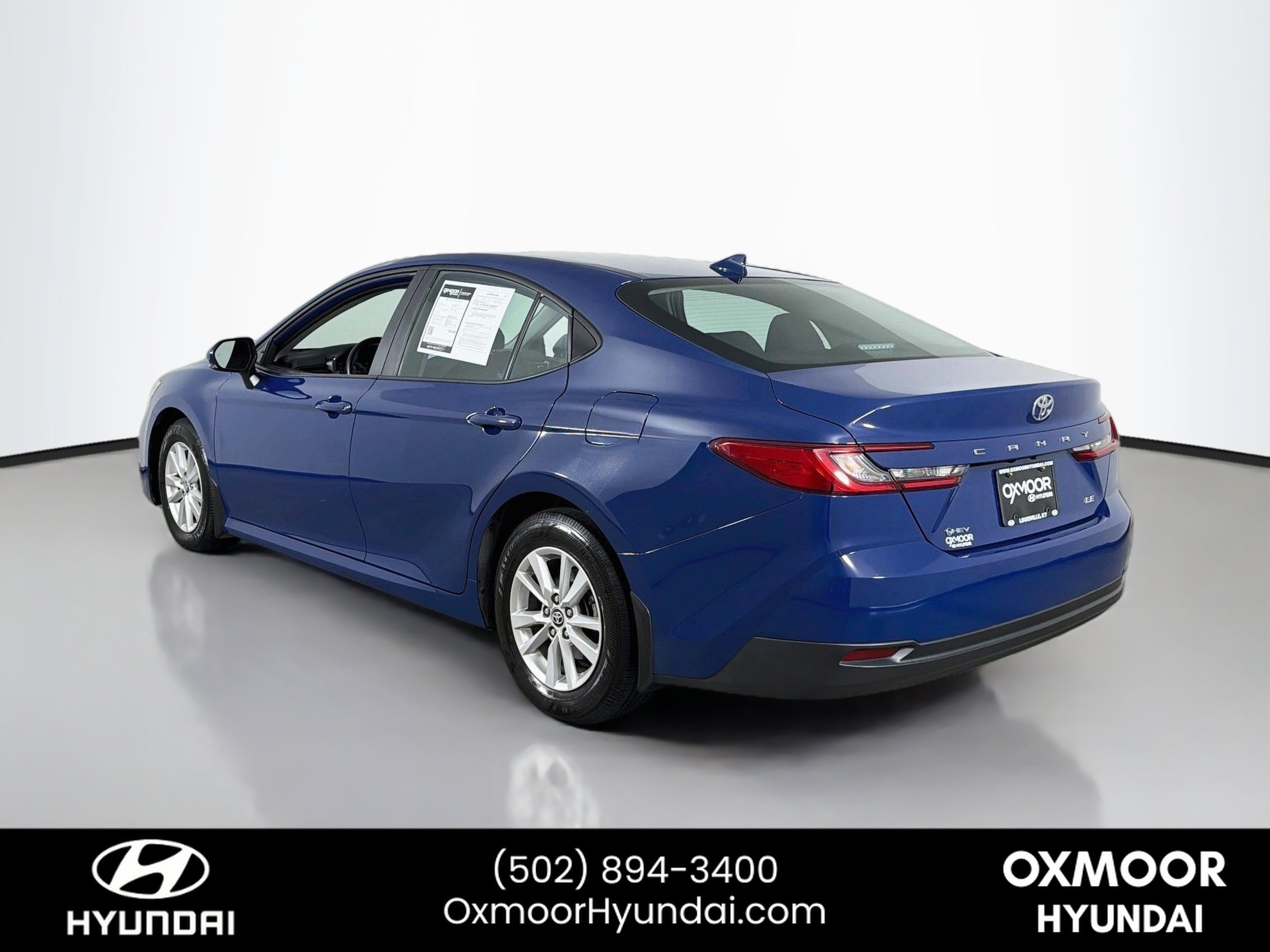 Used 2025 Reservoir Blue Toyota LE image 5