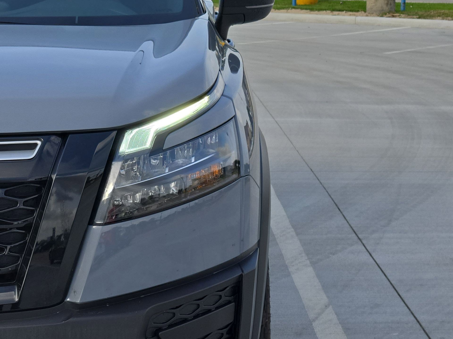 Used 2025 Solid Gray/Super Black Nissan Rock Creek image 10