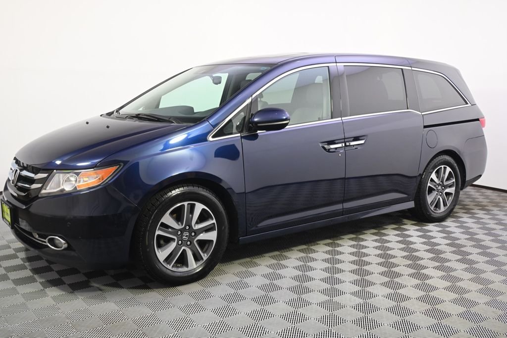Used 2016 Honda Odyssey Touring with VIN 5FNRL5H99GB163496 for sale in St. Louis Park, Minnesota
