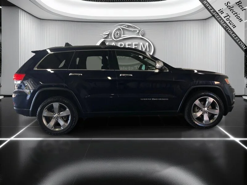 Used 2014 True Blue Pearlcoat Jeep Limited image 4