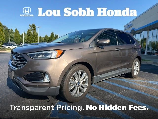 Used 2019 Stone Gray Metallic Ford Titanium image 1