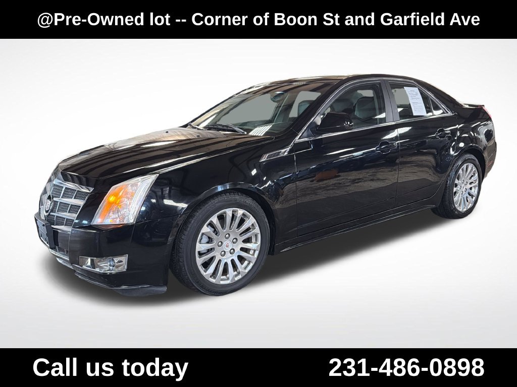 Used 2011 Black Cadillac Premium image 1