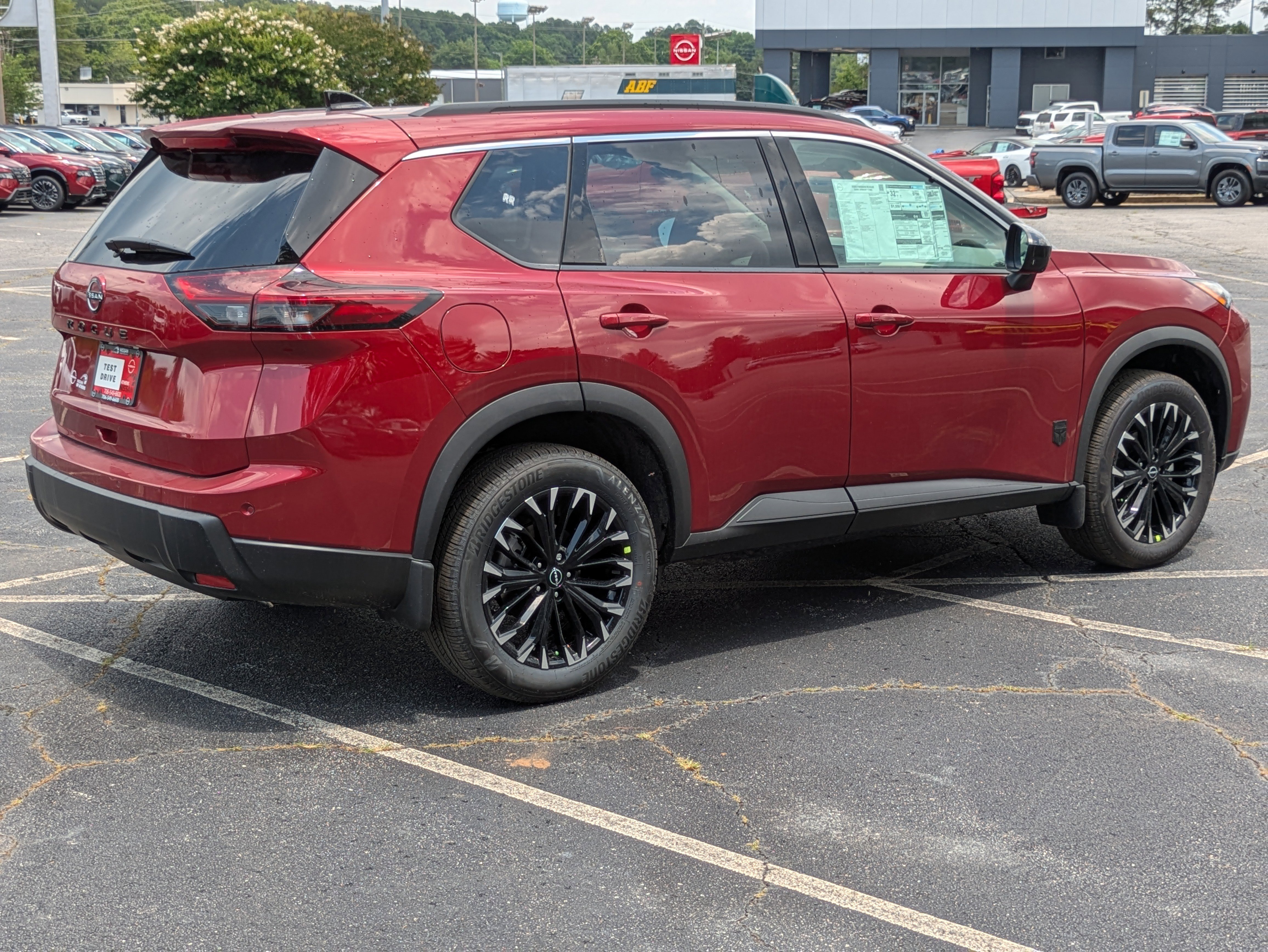 New 2026 Red Nissan Dark Armor image 2
