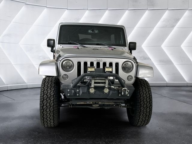 Used 2016 Silver Jeep Unlimited Sahara image 2