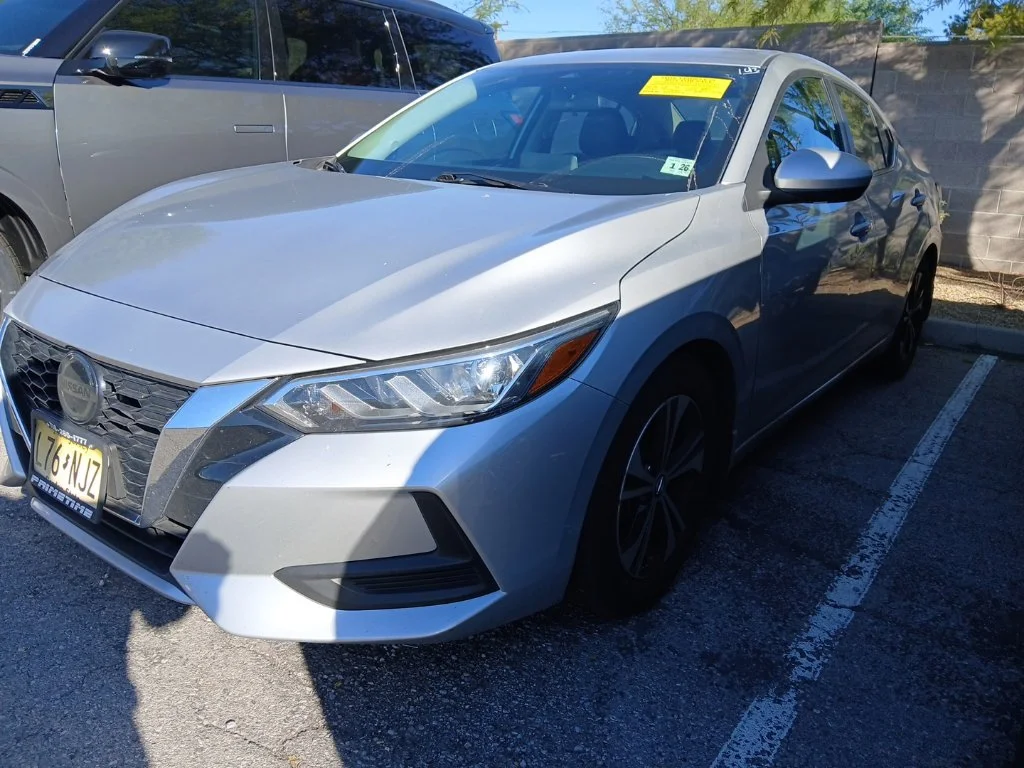 Certified Used 2021 Silver Nissan SV image 1
