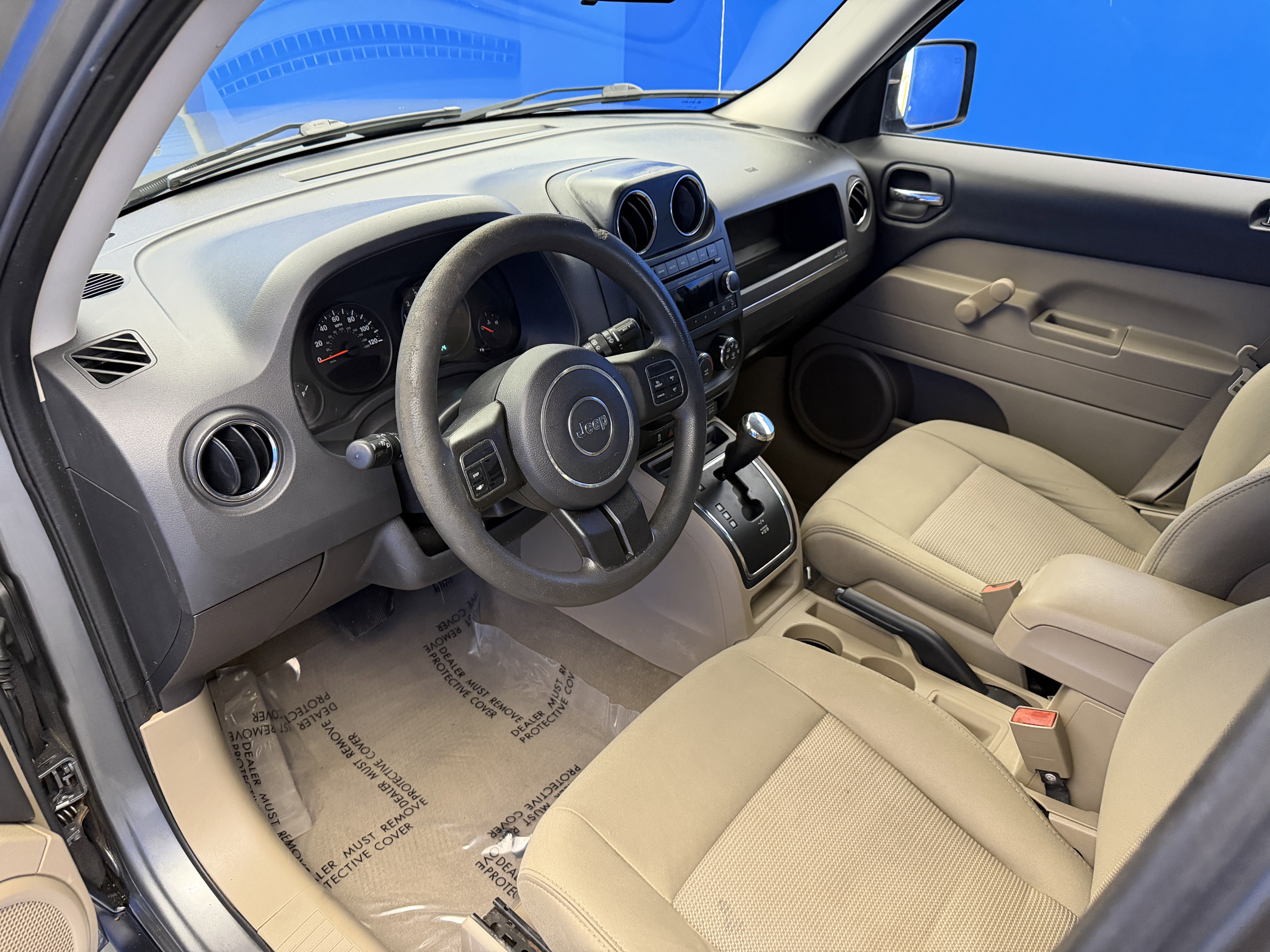 Used 2012 Mineral Gray Metallic Jeep Sport image 10