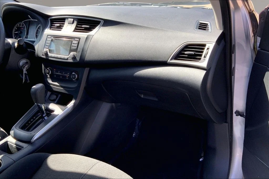 Used 2018 Brilliant Silver Metallic Nissan S image 16