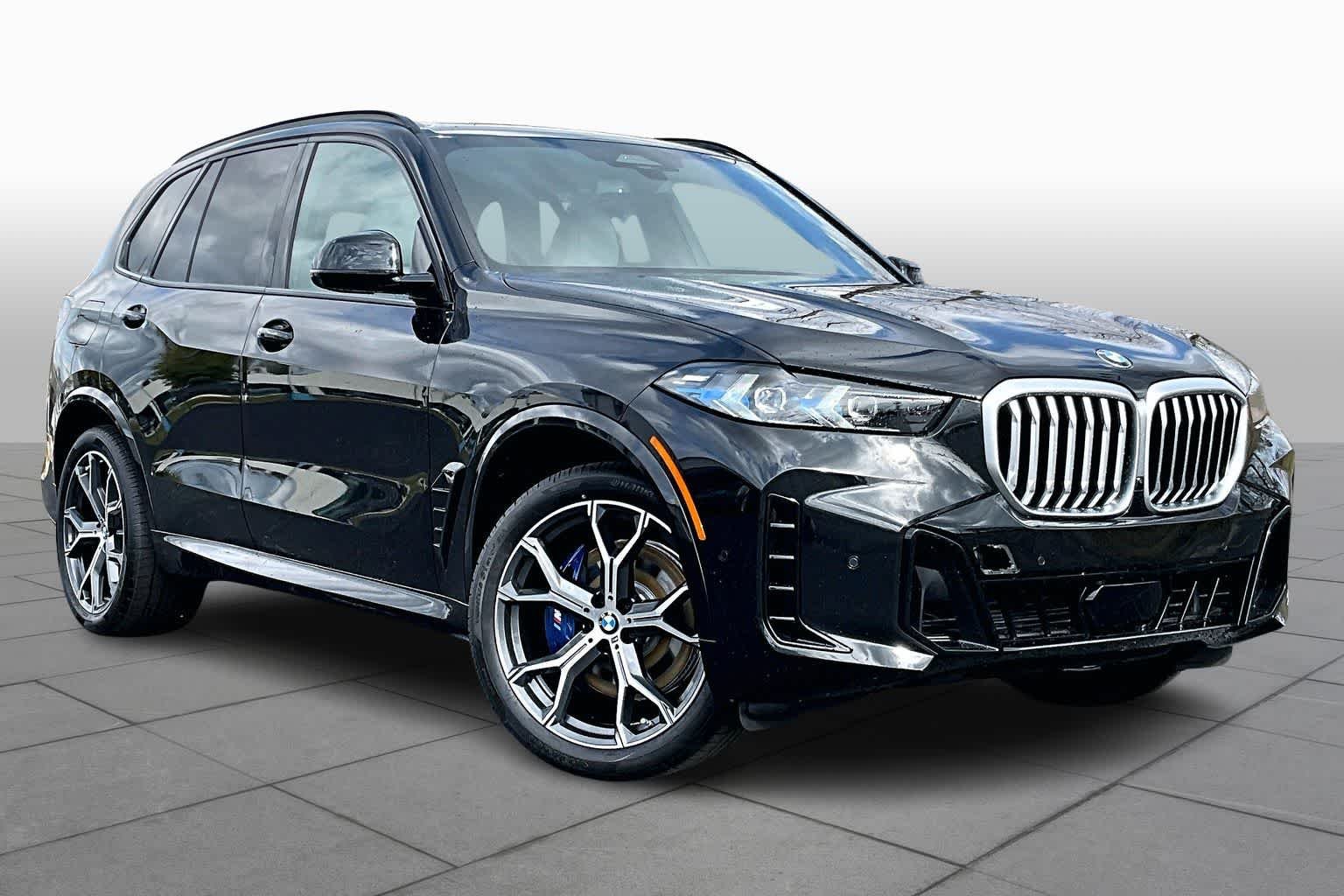 New 2026 Black Sapphire Metallic BMW sDrive40i image 2