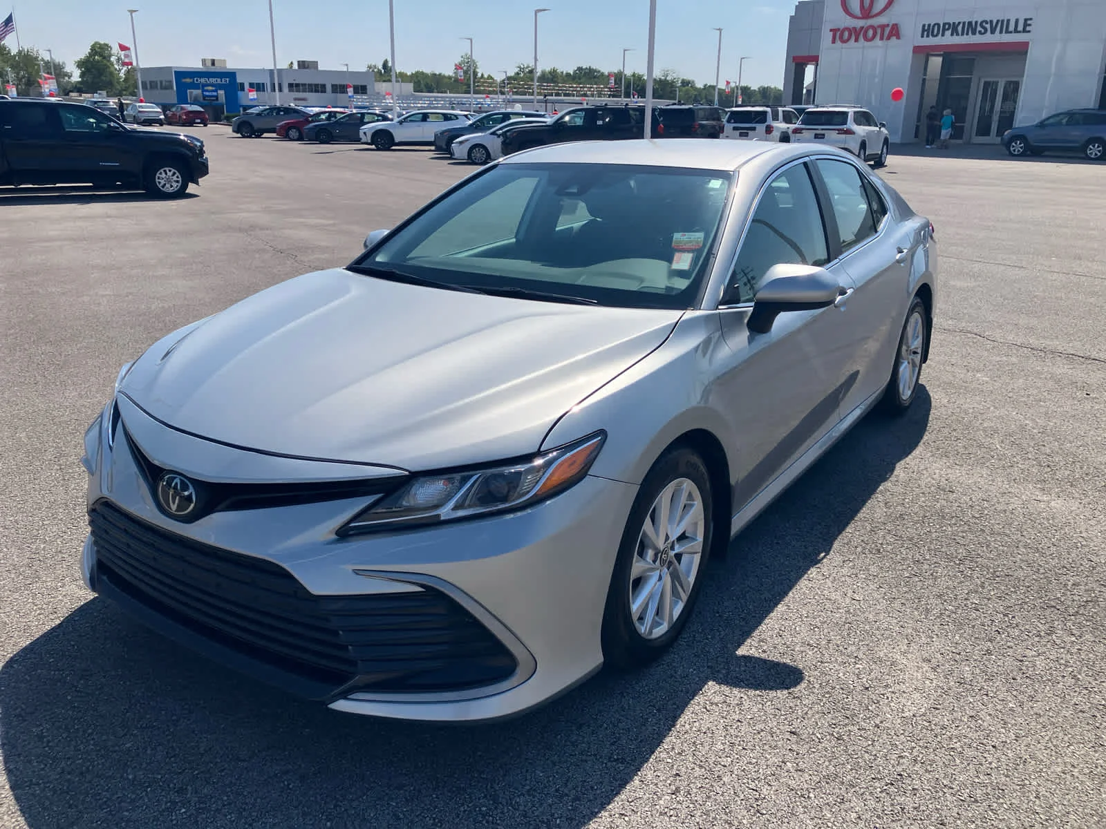 Used 2023 Celestial Silver Metallic Toyota LE image 3
