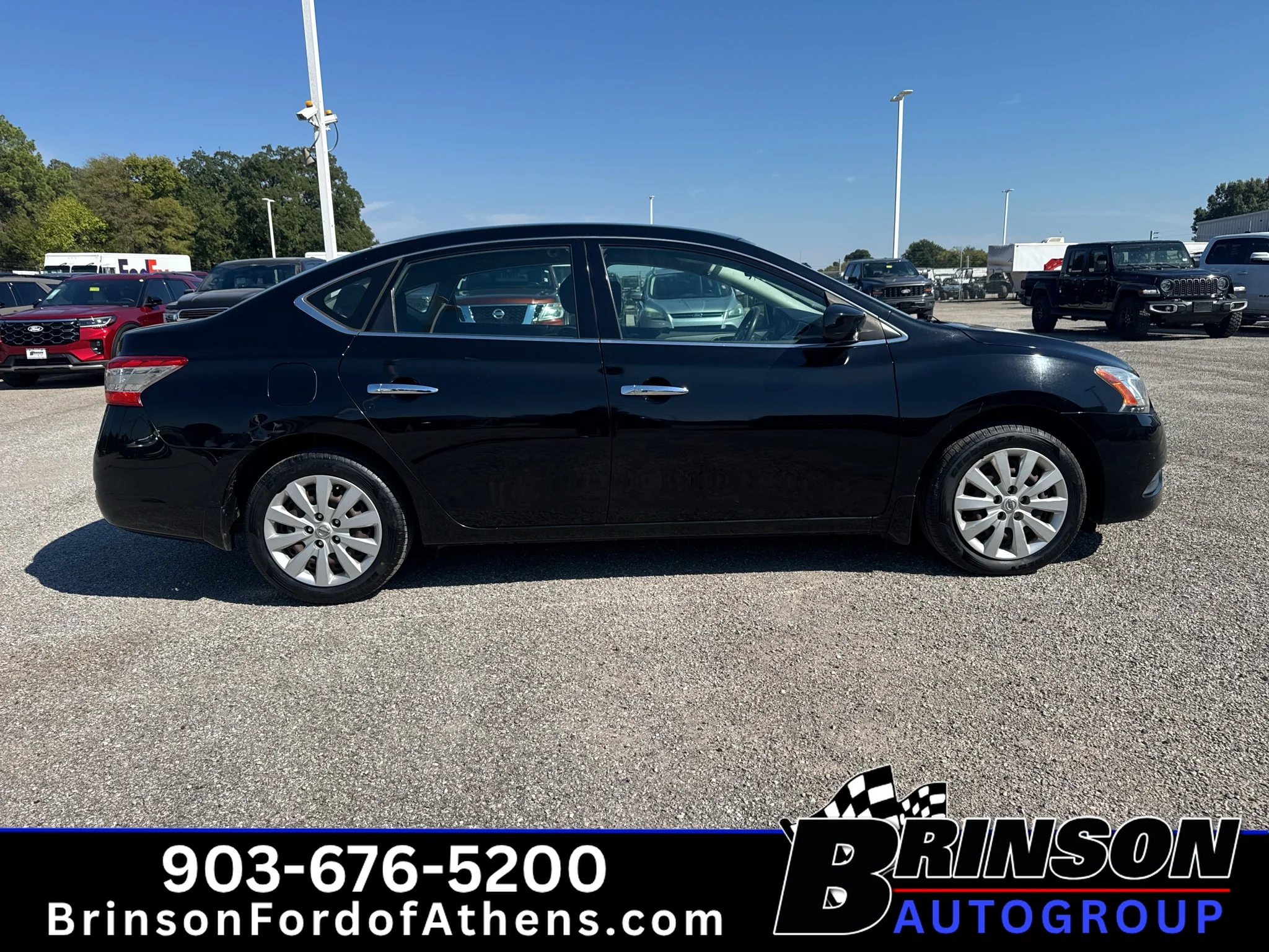 Used 2015 Super Black Nissan SV image 4