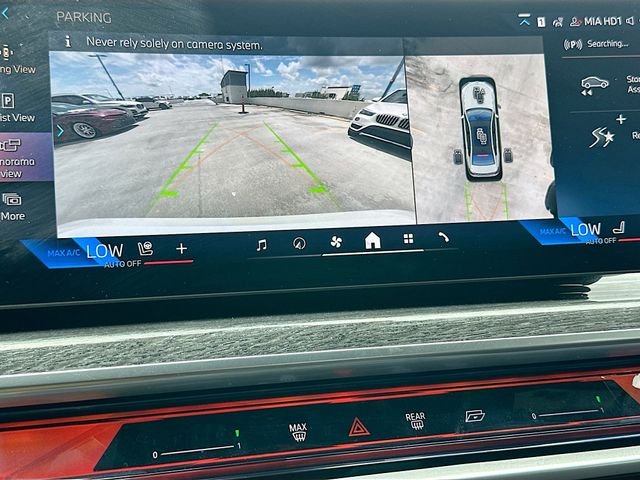 Certified Used 2025 White BMW 740i image 14