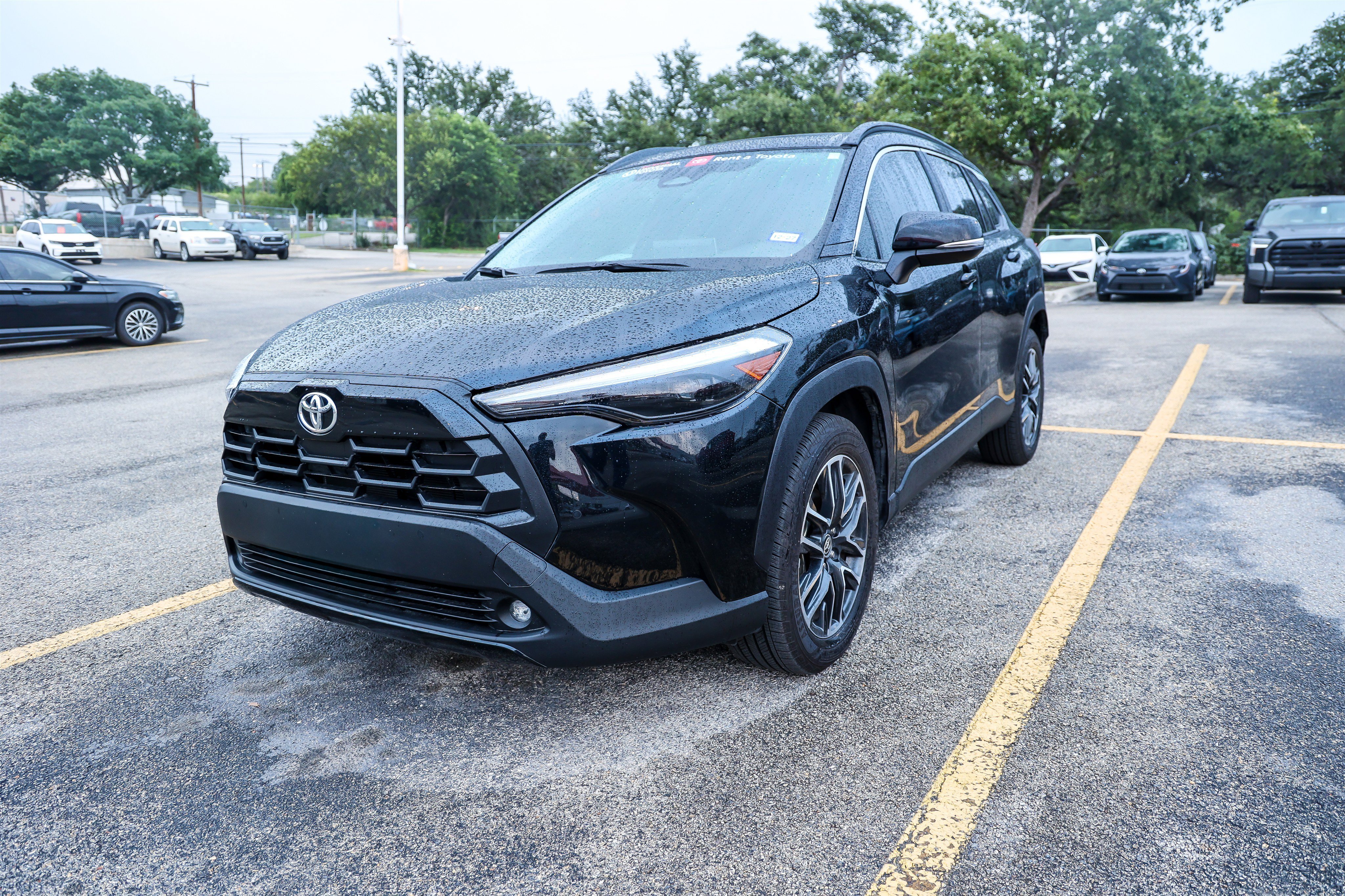 Used 2026 JET BLACK Toyota XLE image 1
