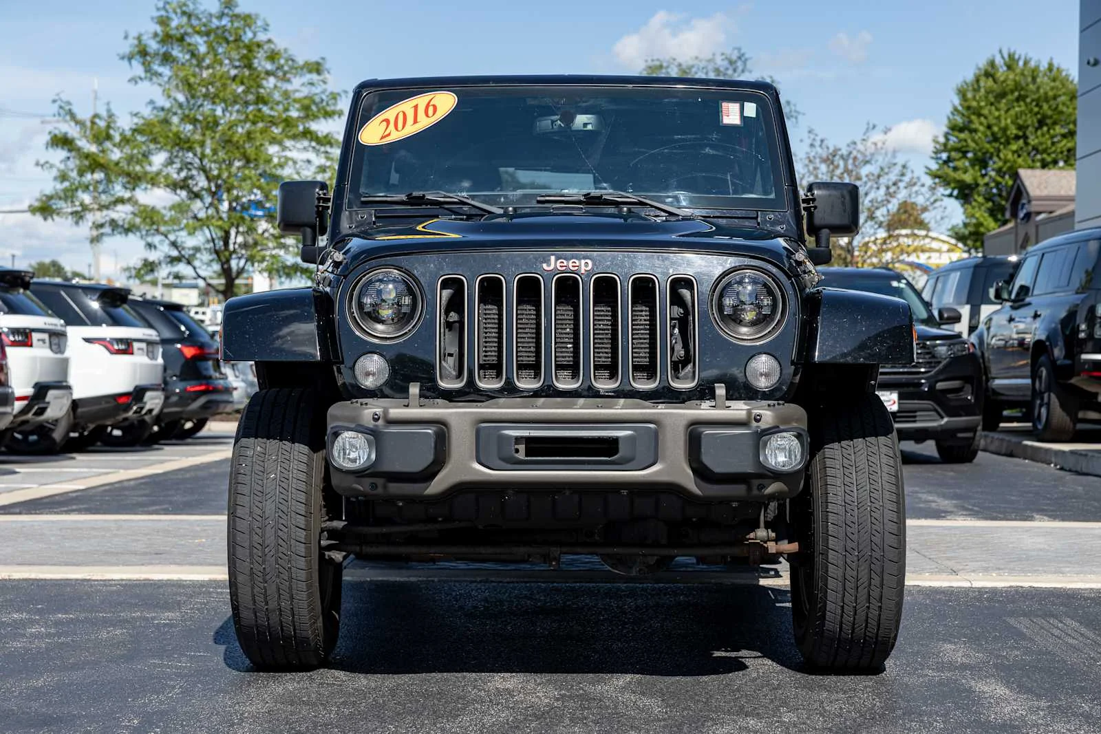 Used 2016 Black Clearcoat Jeep 75th Anniversary image 2