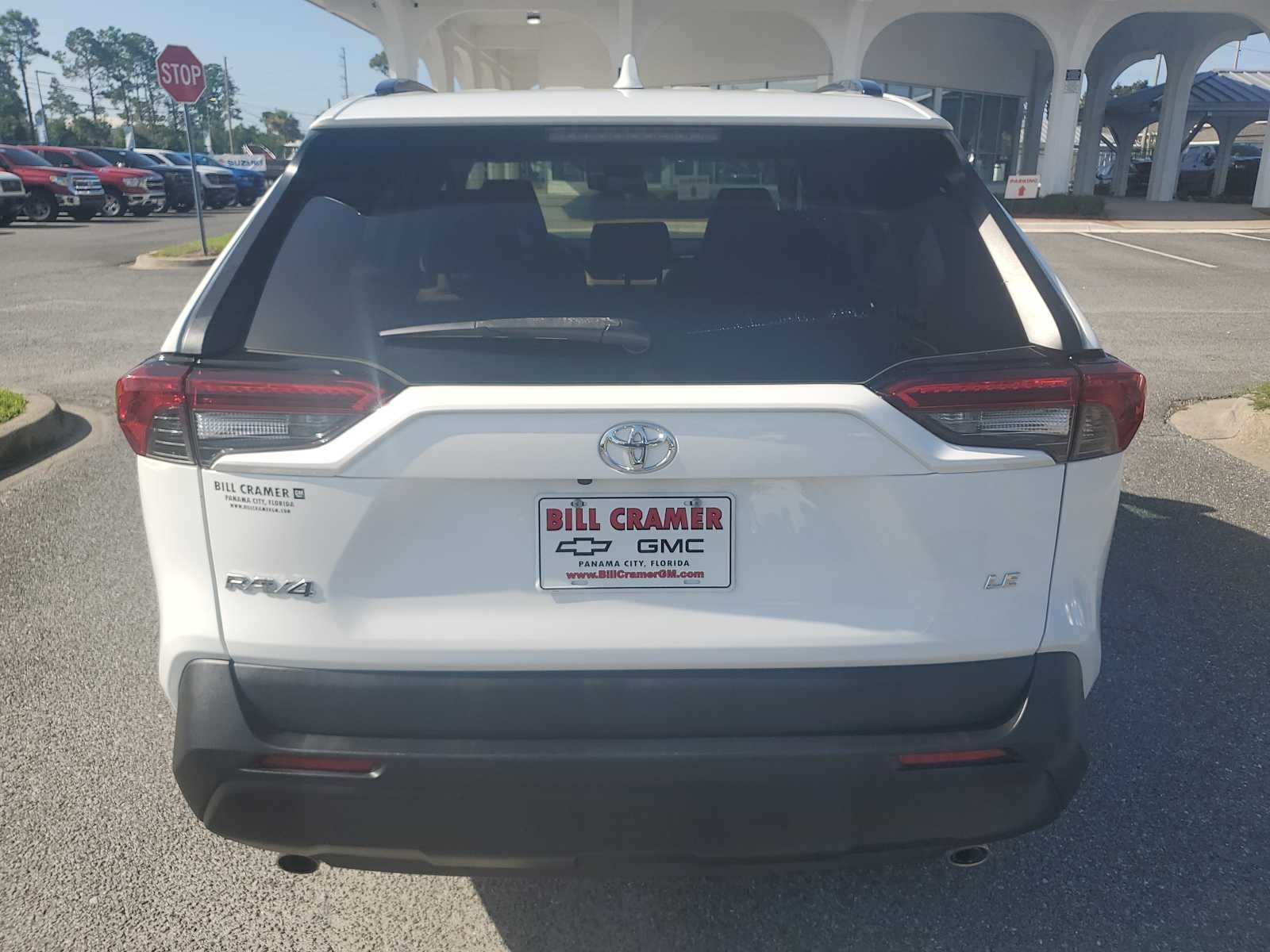 Used 2019 Super White White Toyota LE image 4
