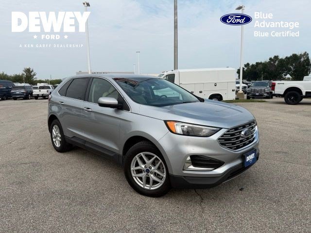 Used 2022 Silver Metallic Ford SEL image 1