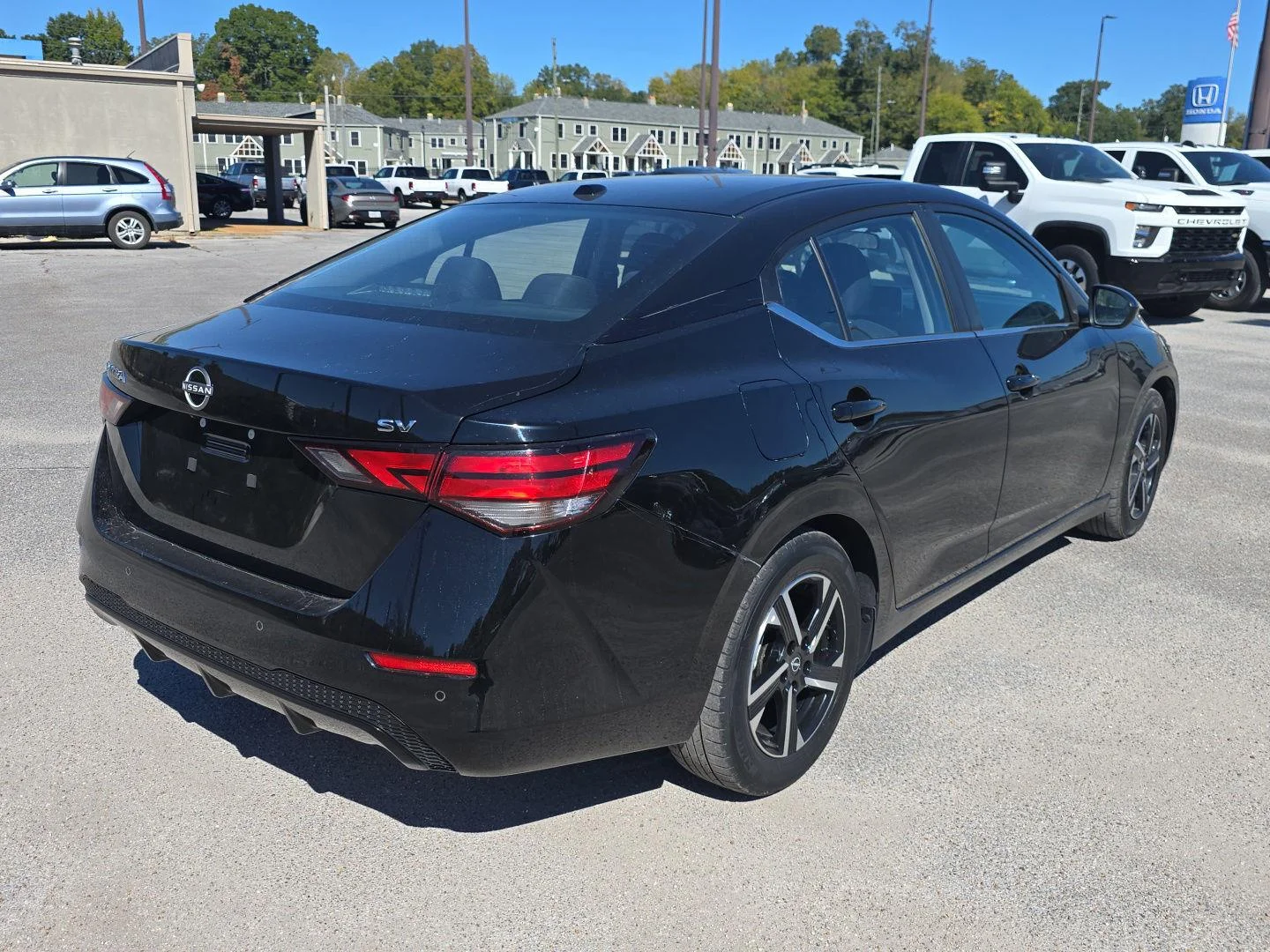 Used 2024 Super Black Nissan SV image 3