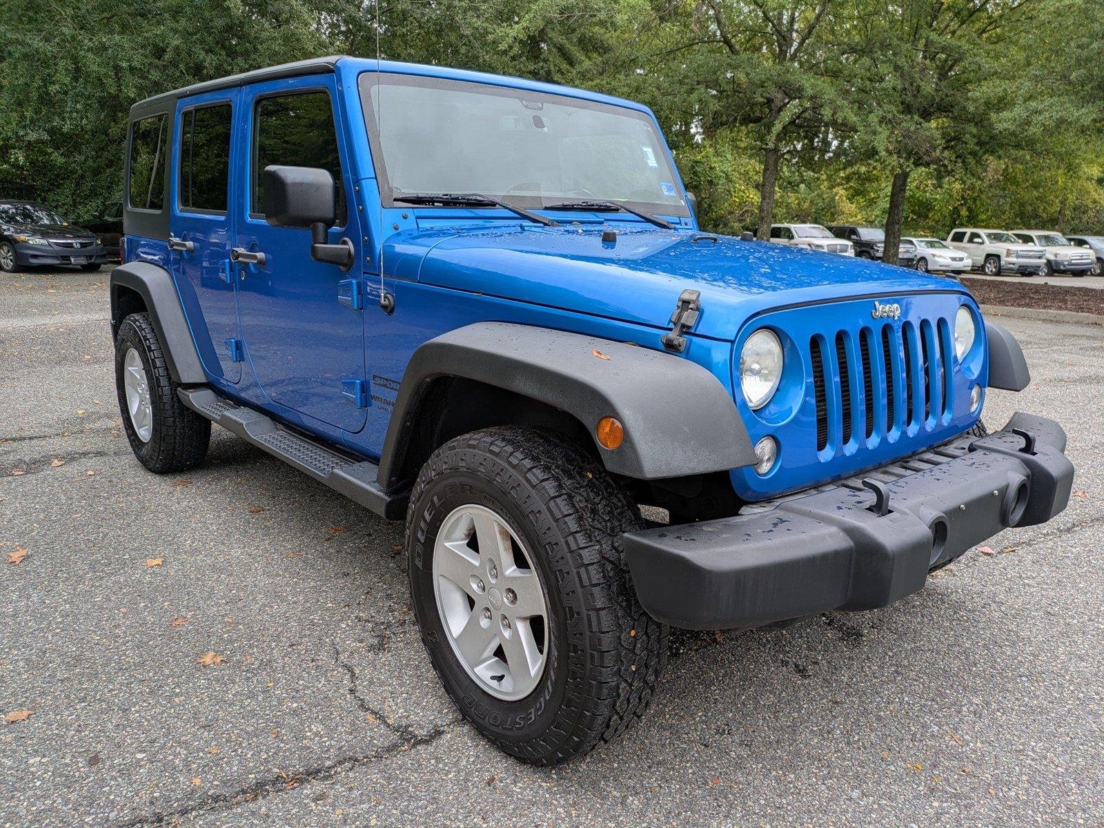 Used 2015 Hydro Blue Pearl Coat Jeep Sport image 2