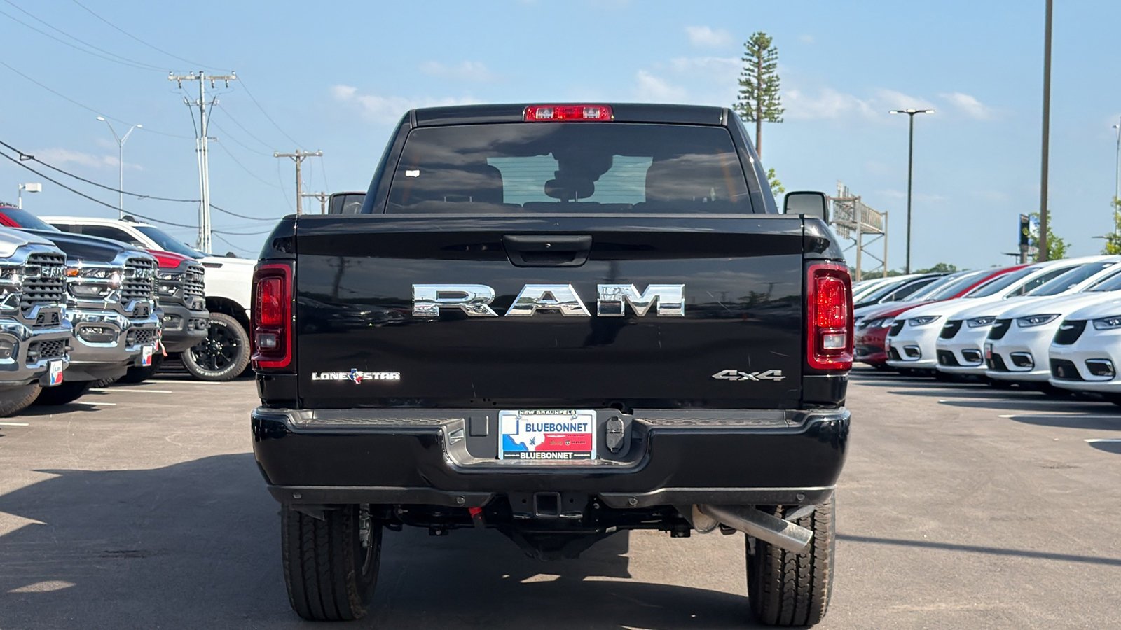 New 2026 Diamond Black Crystal Pearl-Coat Exterior Paint RAM Lone Star image 6