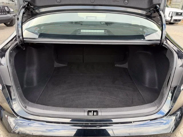 Used 2025 Midnight Black Metallic Toyota LE image 26