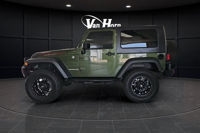 Used 2009 Green Metallic Jeep Rubicon image 4