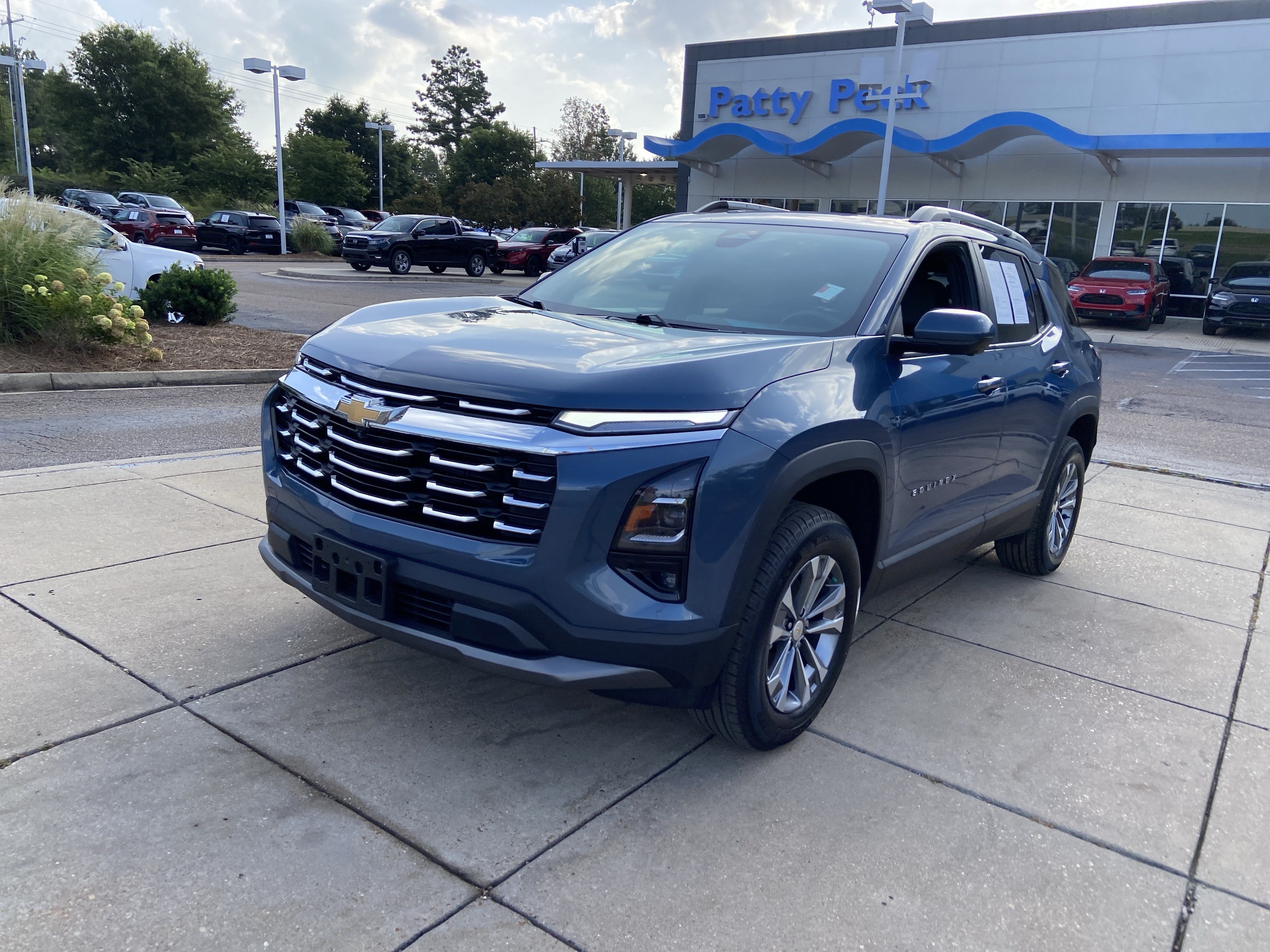 Used 2025 Lakeshore Blue Metallic Chevrolet AWD LT image 4