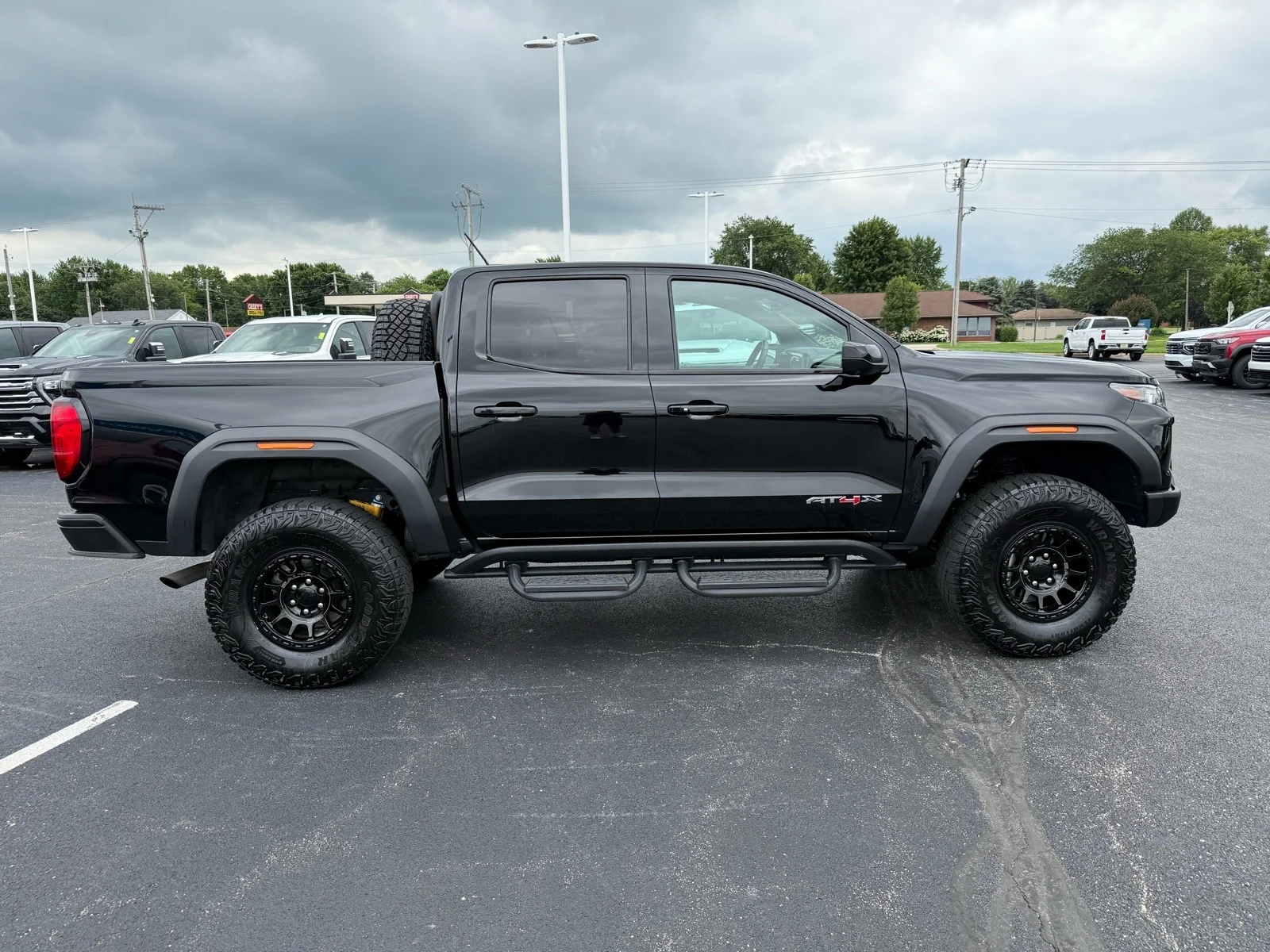 Used 2024 Onyx Black GMC AT4X image 9
