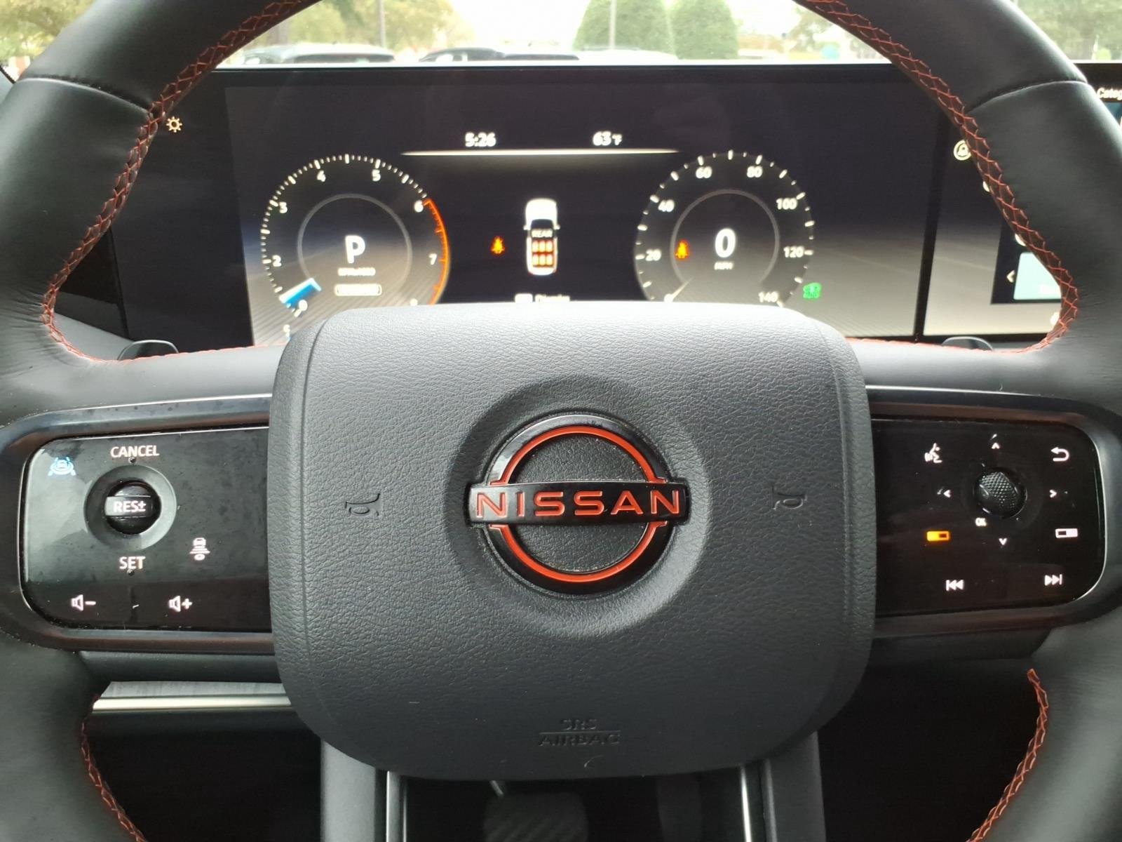 Used 2025 Aspen White Tricoat/Super Black Nissan PRO-4X image 14