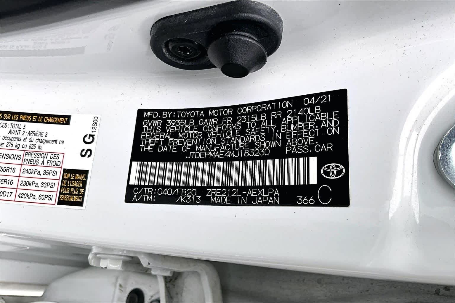 Used 2021 Super White Toyota LE image 34