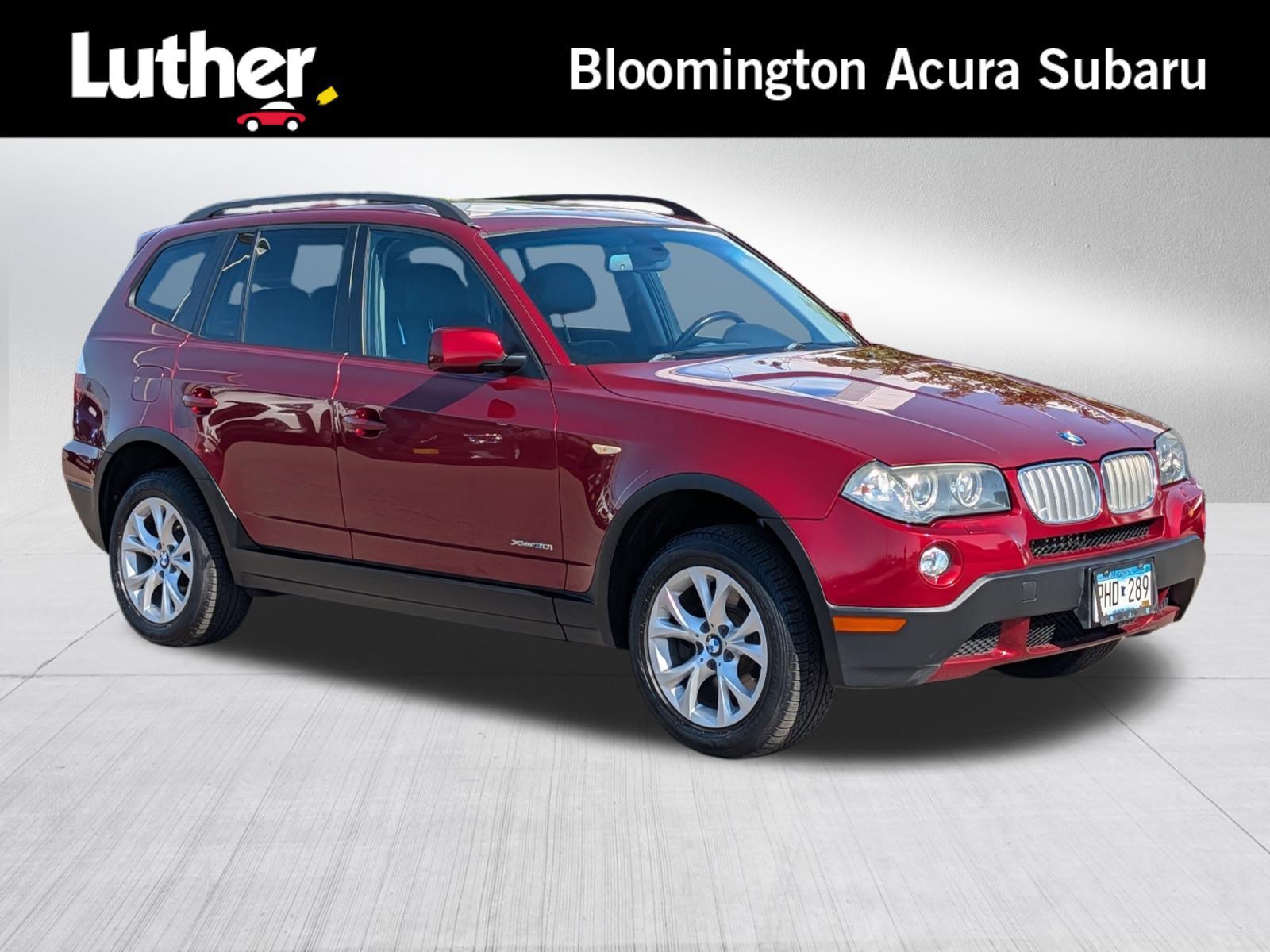 Used 2009 Vermillion Red Metallic BMW xDrive30i image 1