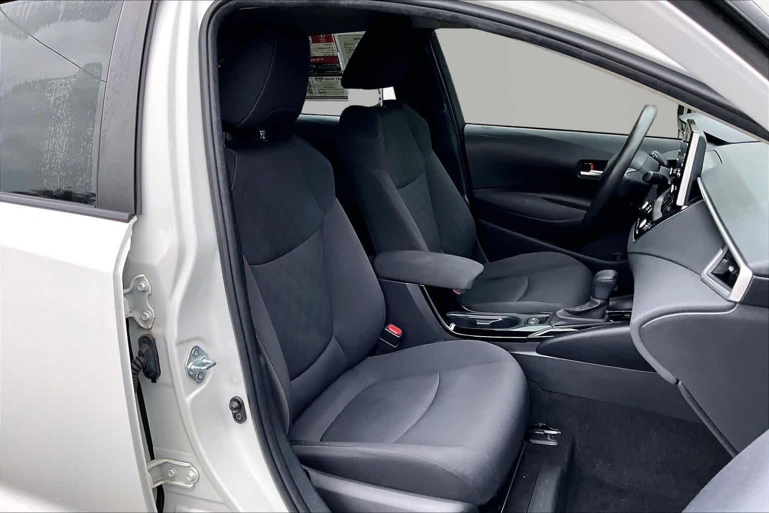 Used 2021 Super White Toyota LE image 9