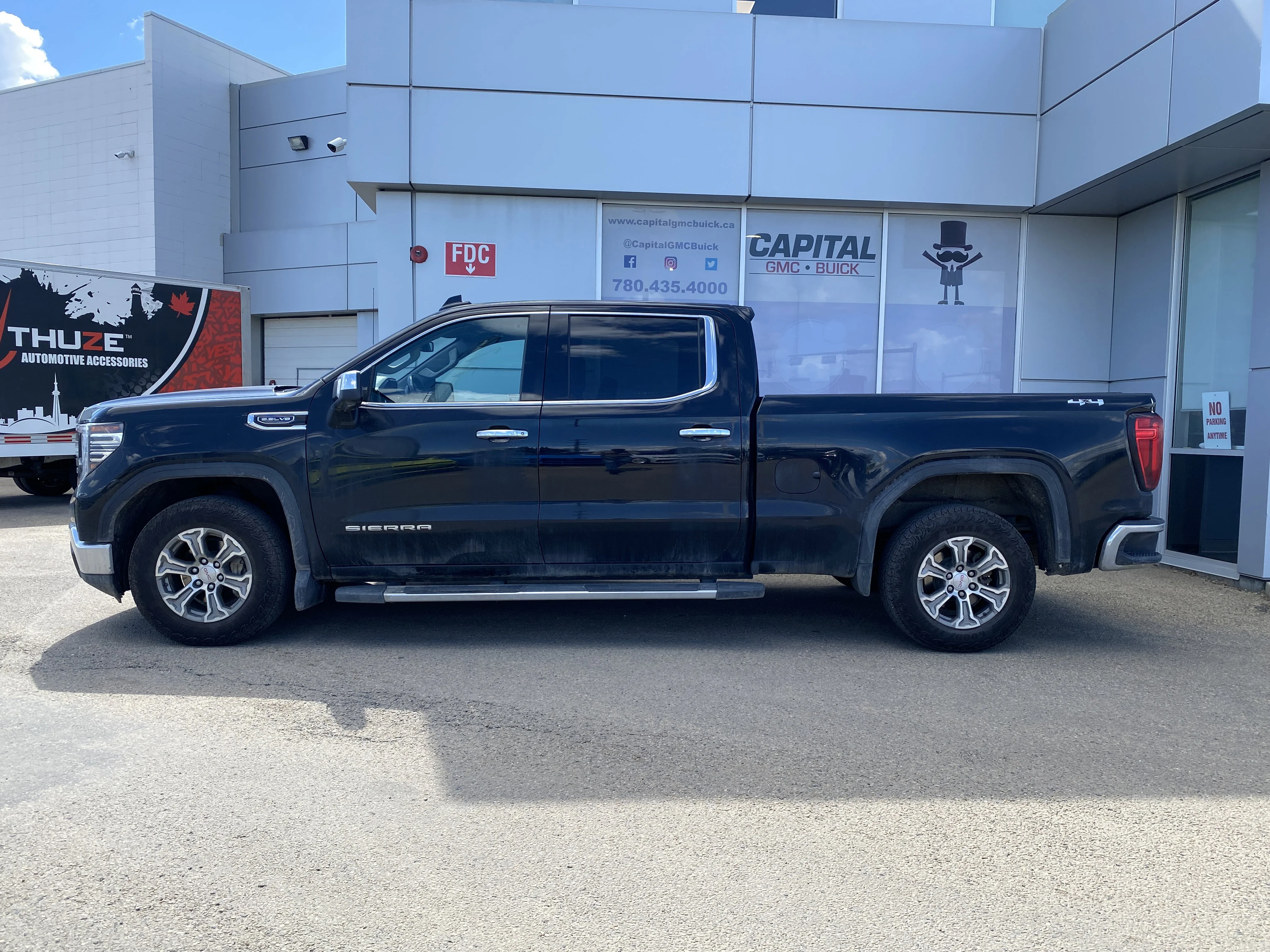 Certified Used 2024 Black GMC Crew Cab SLT image 2