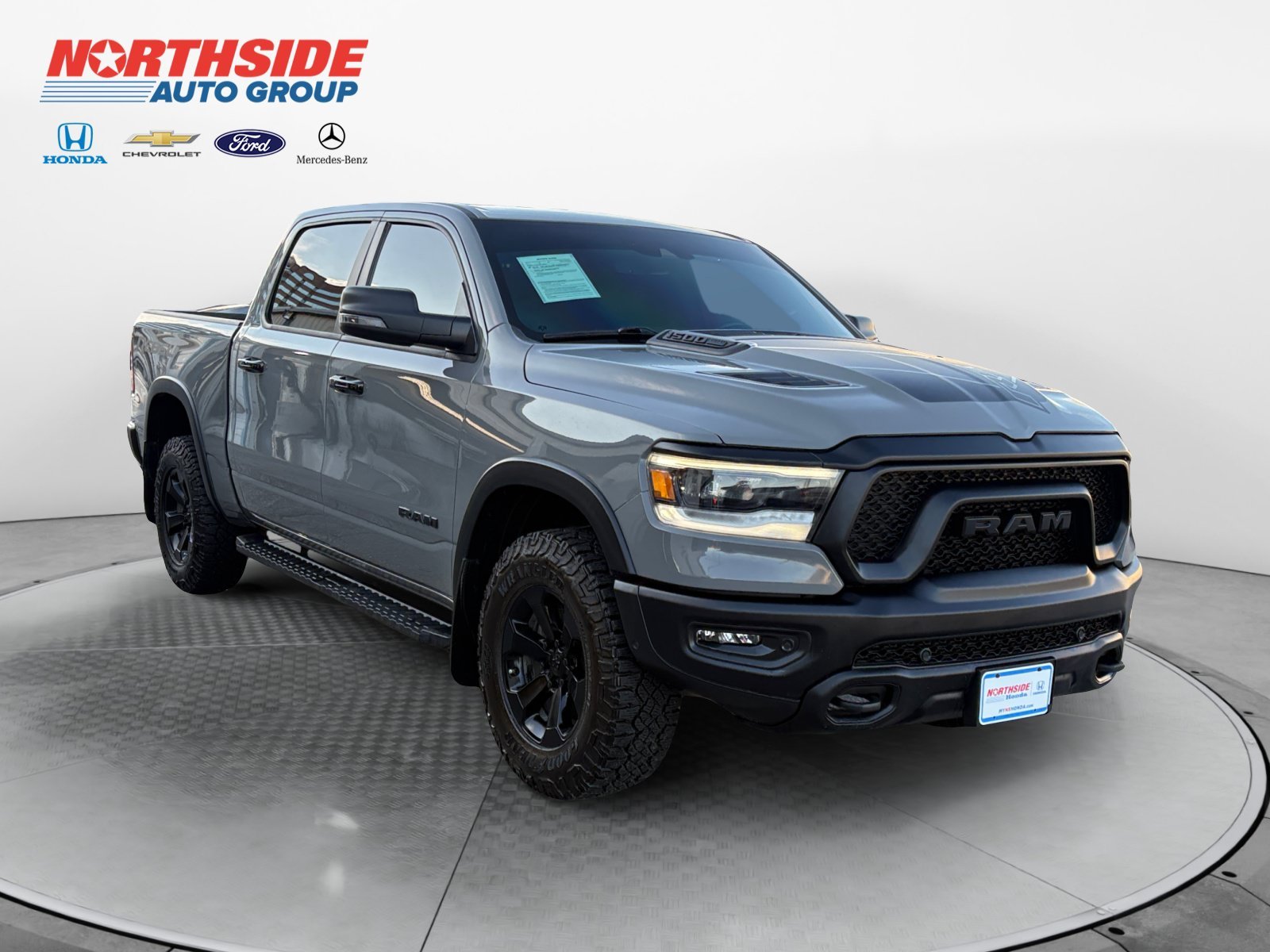 Used 2023 Ceramic Gray Clearcoat Ram Rebel image 1