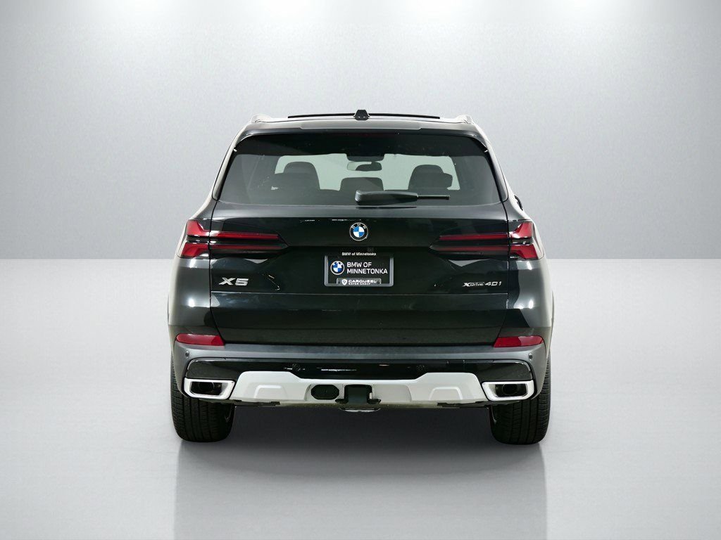 Certified Used 2026 Black Sapphire Metallic BMW xDrive40i image 11