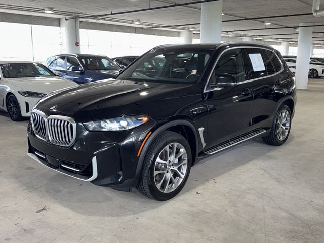 Used 2025 Black Sapphire Metallic BMW sDrive40i image 4