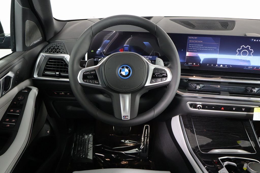 New 2026 Black Sapphire Metallic BMW xDrive50e image 3