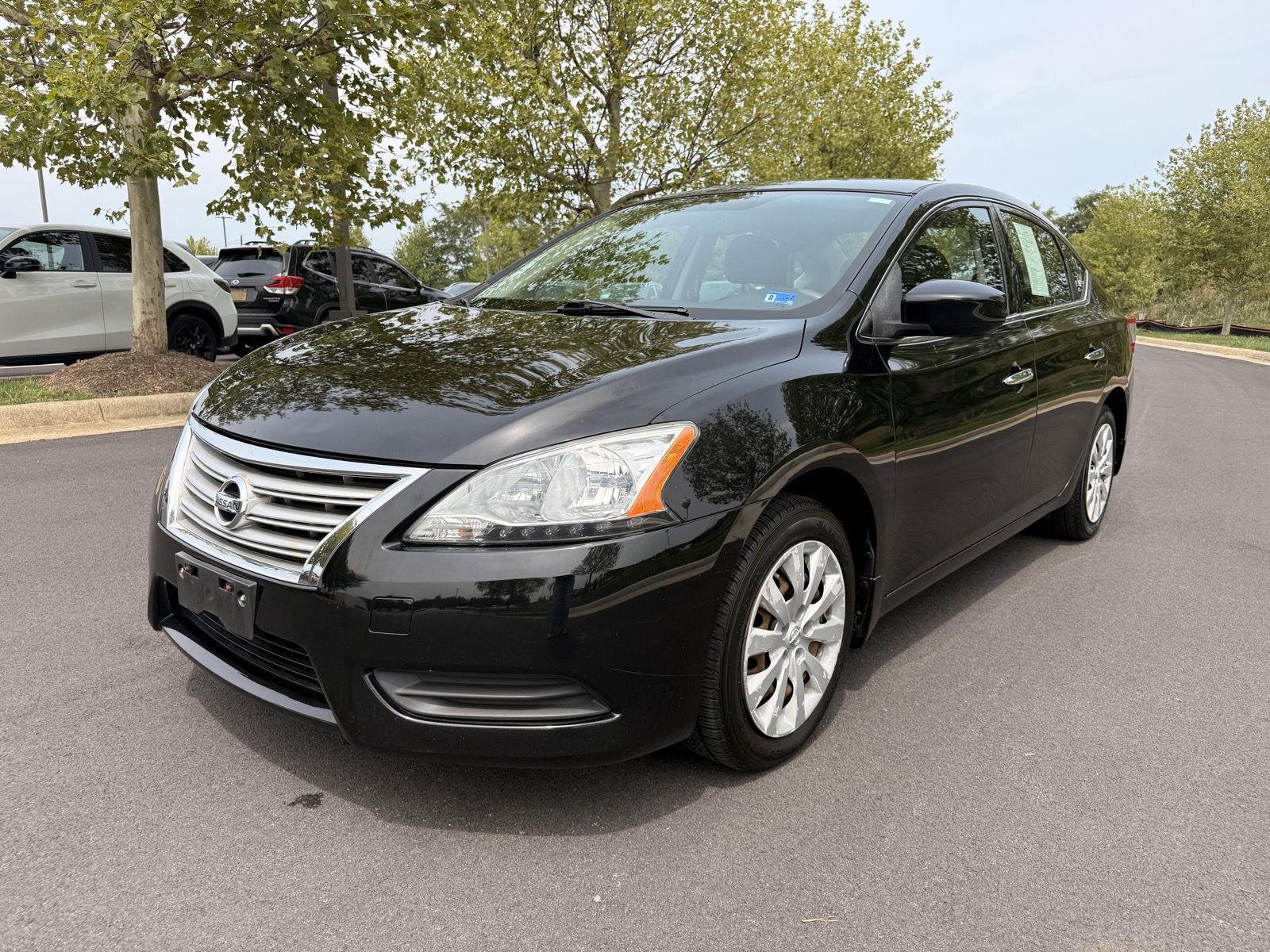 Used 2015 Super Black Nissan S image 2