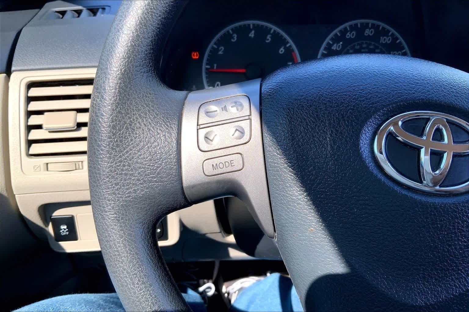 Used 2013 Tropical Sea Metallic Toyota LE image 24