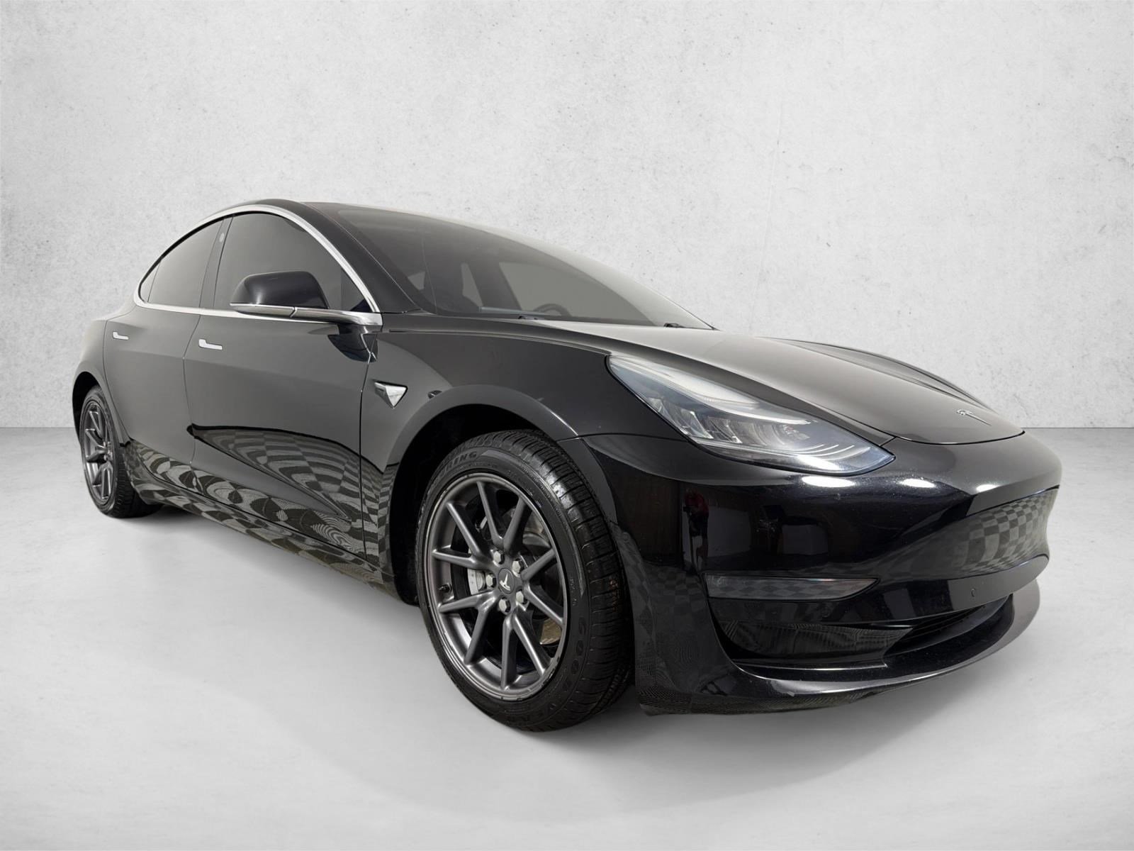 Used 2019 Solid Black Tesla Performance image 1