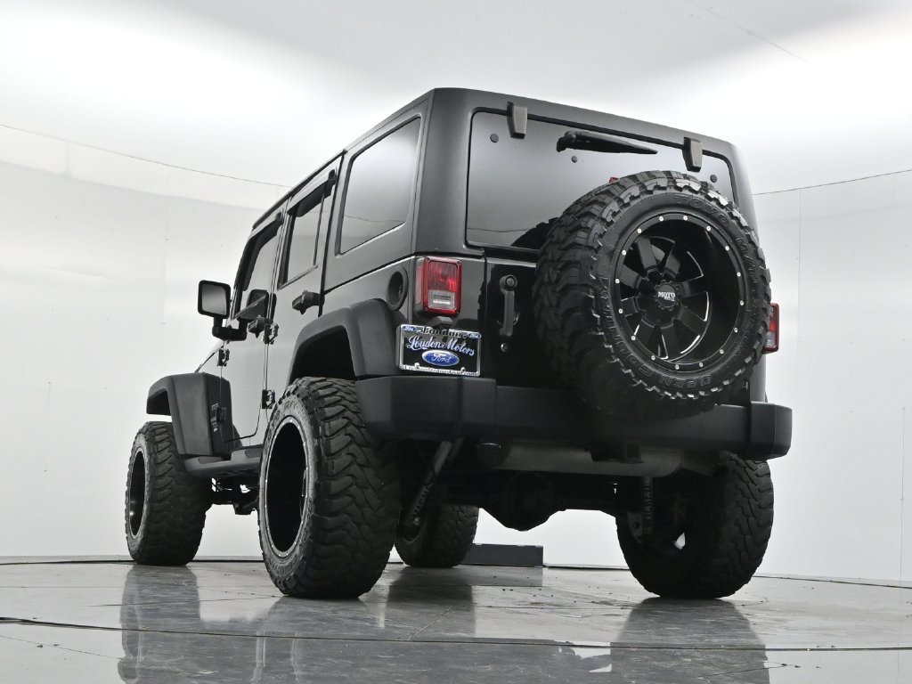 Used 2014 Black Clearcoat Jeep Unlimited Sport image 51