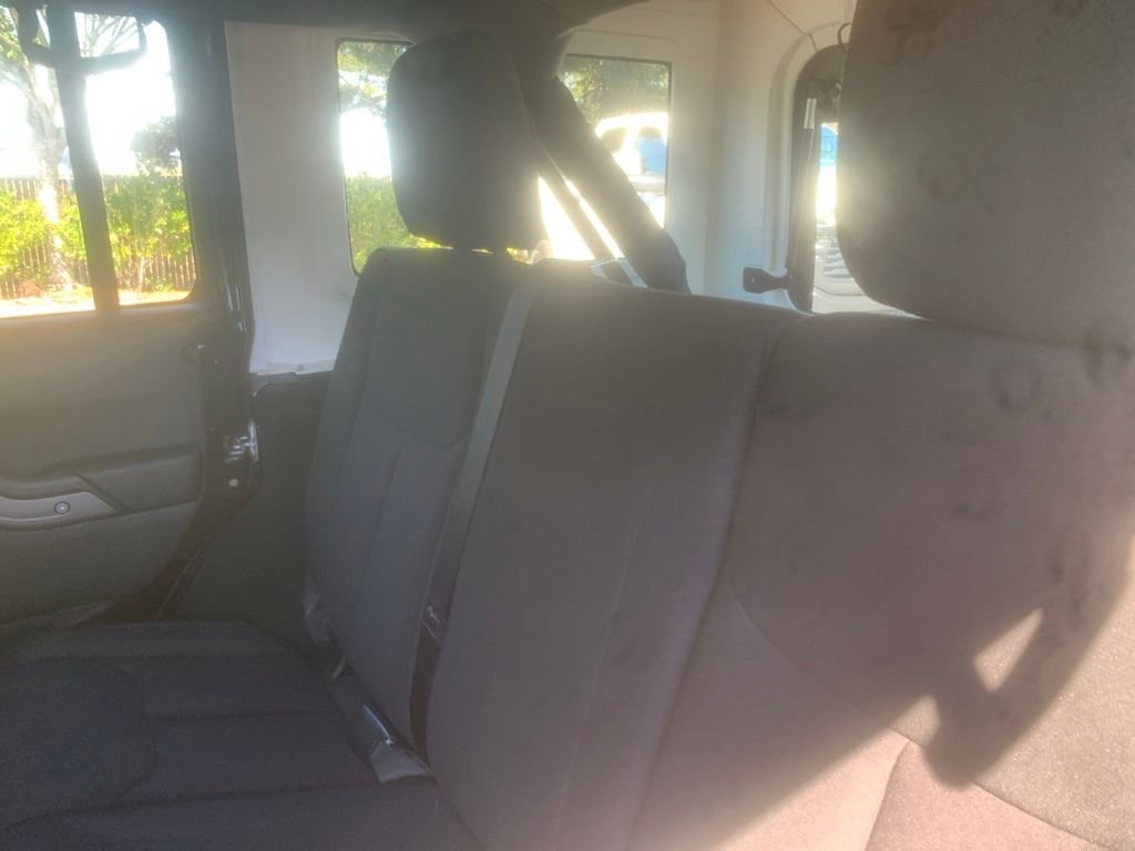 Used 2016 Black Clearcoat Jeep Unlimited Sport image 16
