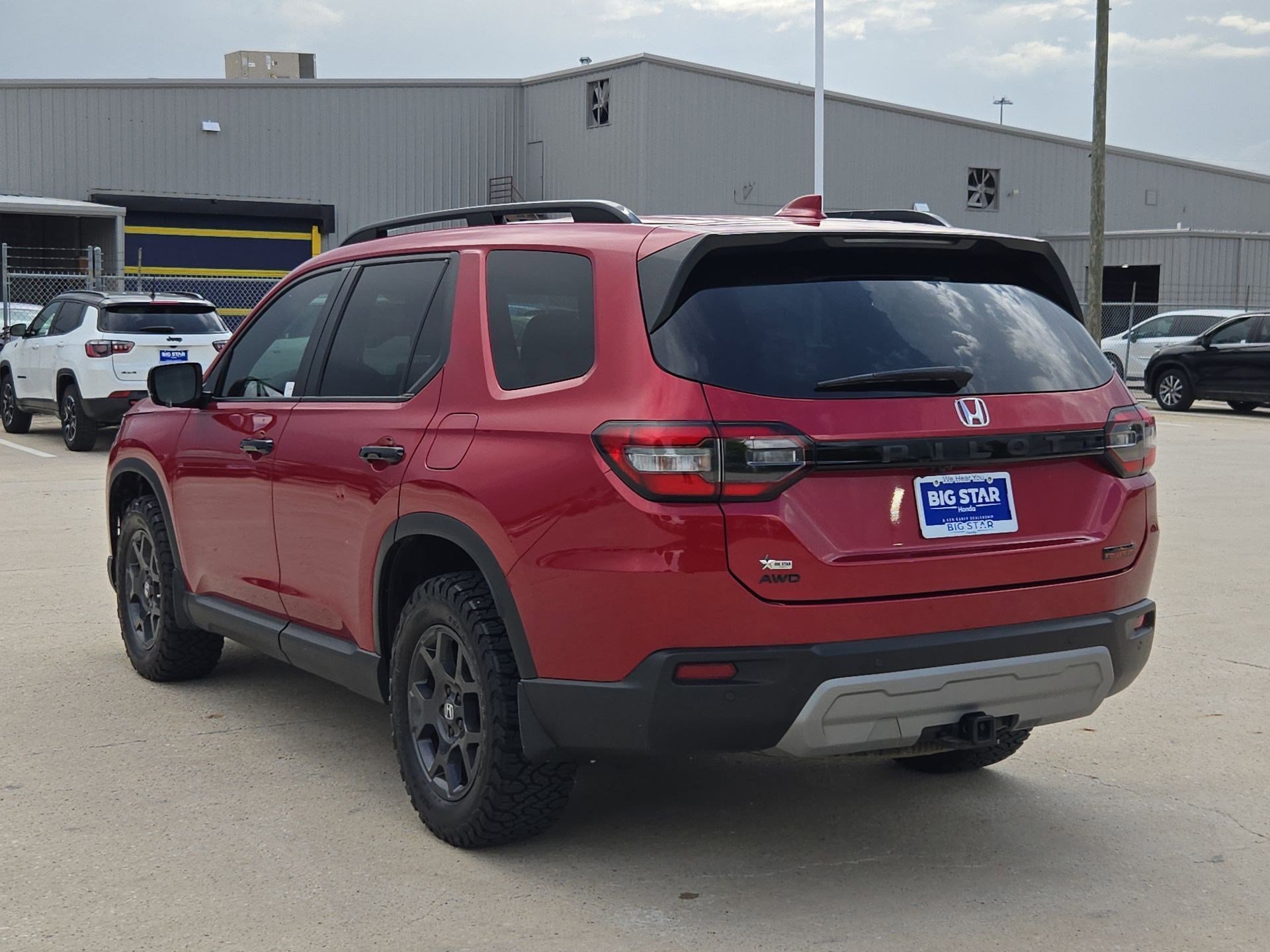 Certified Used 2024 Radiant Red Metallic II Honda AWD TRAILSPORT image 39