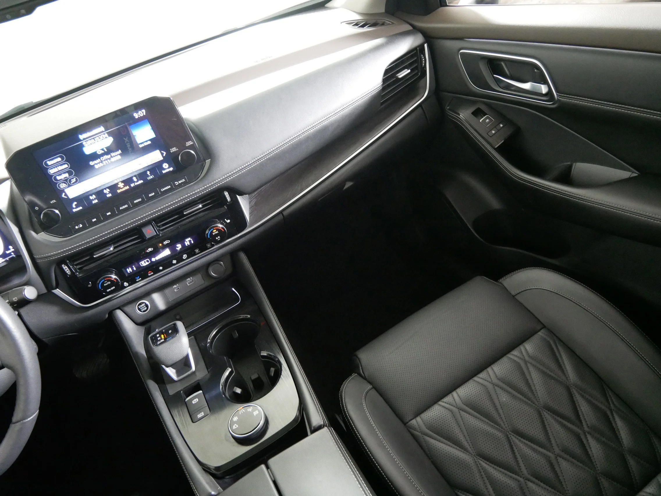 Used 2021 Champagne Silver Metallic Nissan Platinum image 11