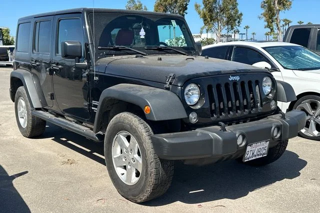 Used 2015 Black Clearcoat Jeep Unlimited Sport image 2