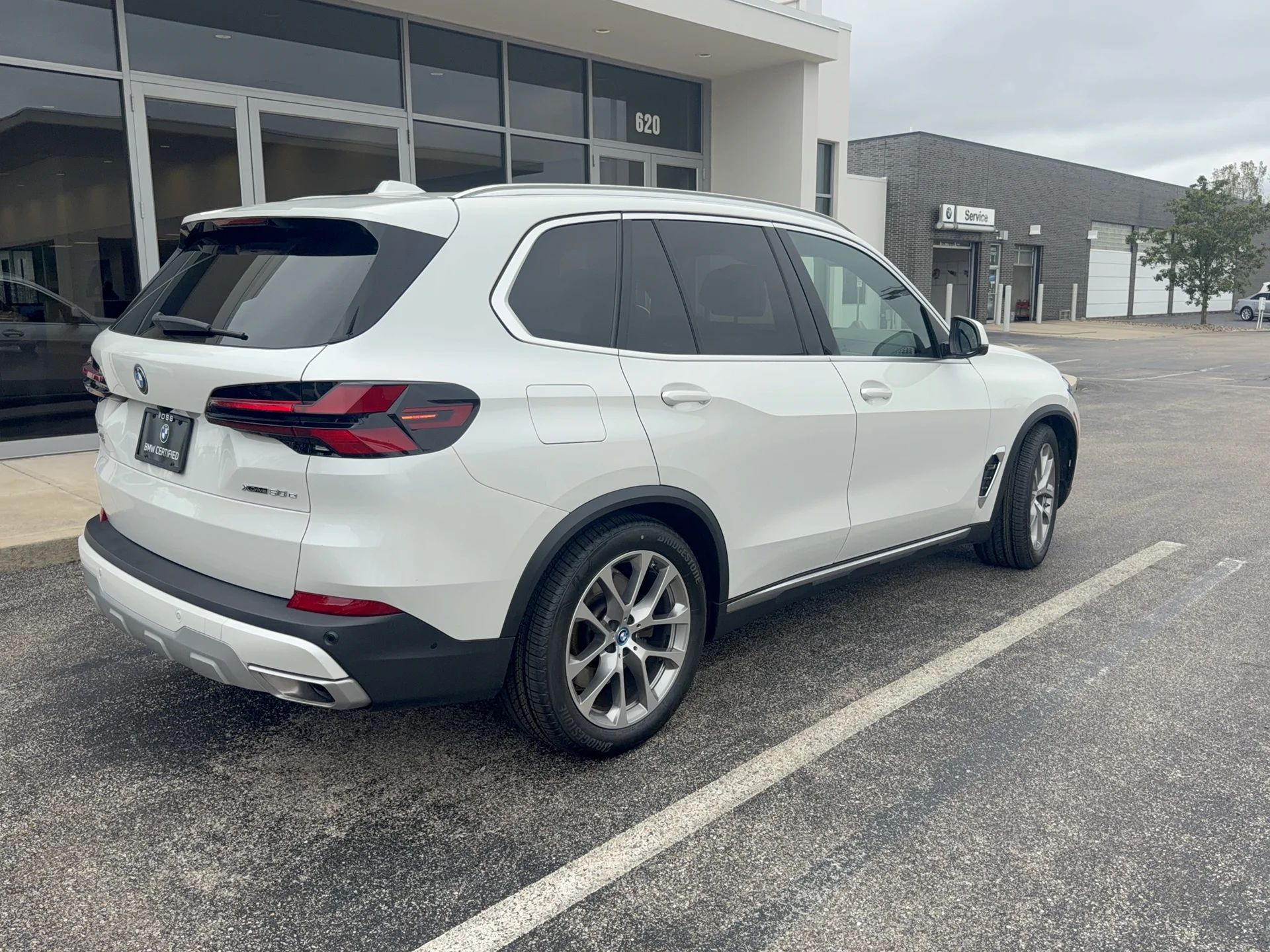 Certified Used 2024 Mineral White Metallic BMW xDrive50e image 3