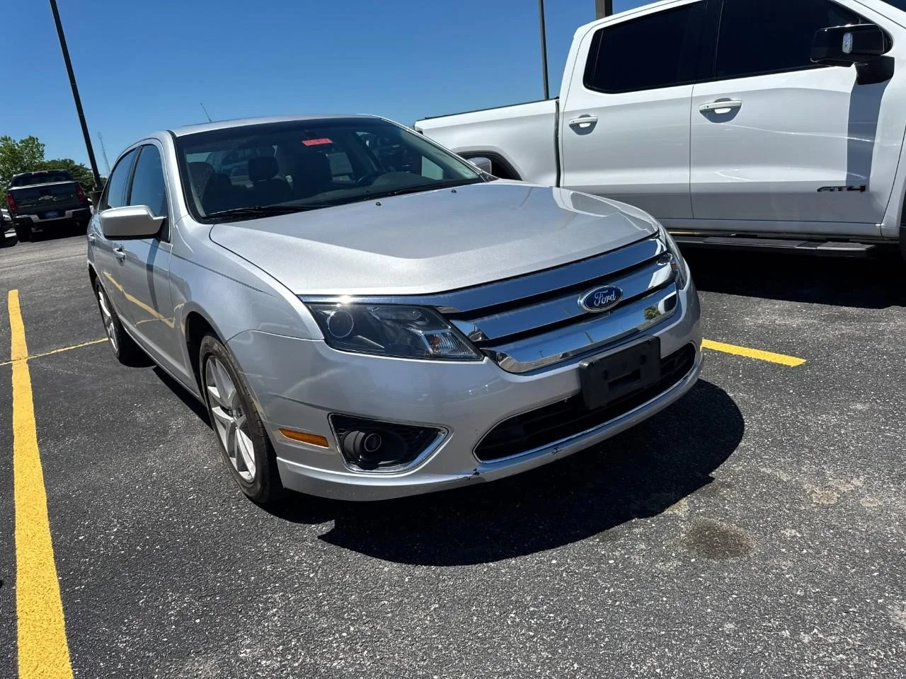 Used 2012 Ingot Silver Metallic Ford 4dr Sdn SEL FWD image 2