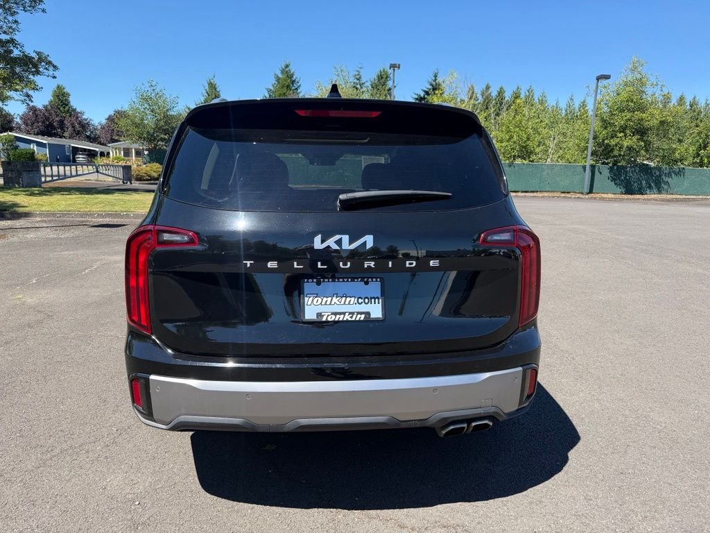Used 2025 Ebony Black Kia S image 5