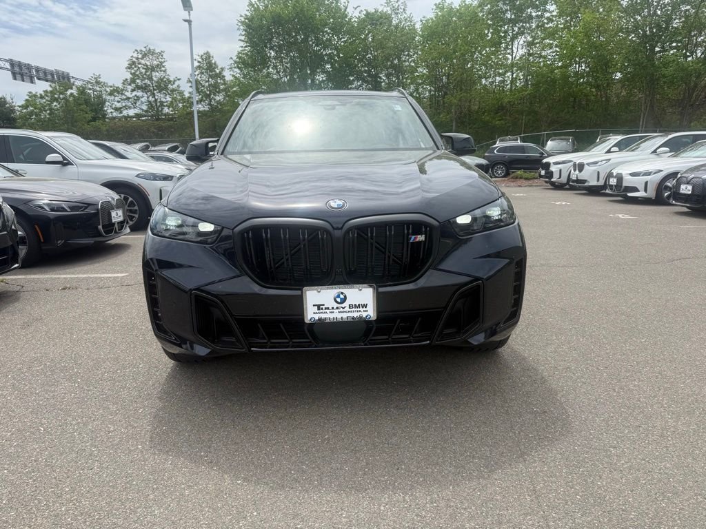 New 2026 Carbon Black Metallic BMW M60i image 2
