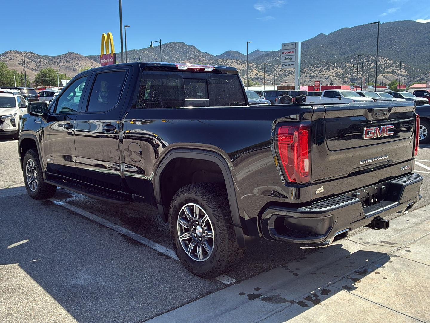 Used 2024 Onyx Black GMC AT4 image 4