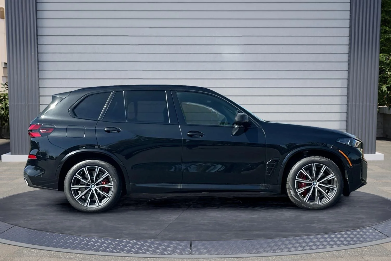 New 2026 Black Sapphire Metallic BMW xDrive50e image 3