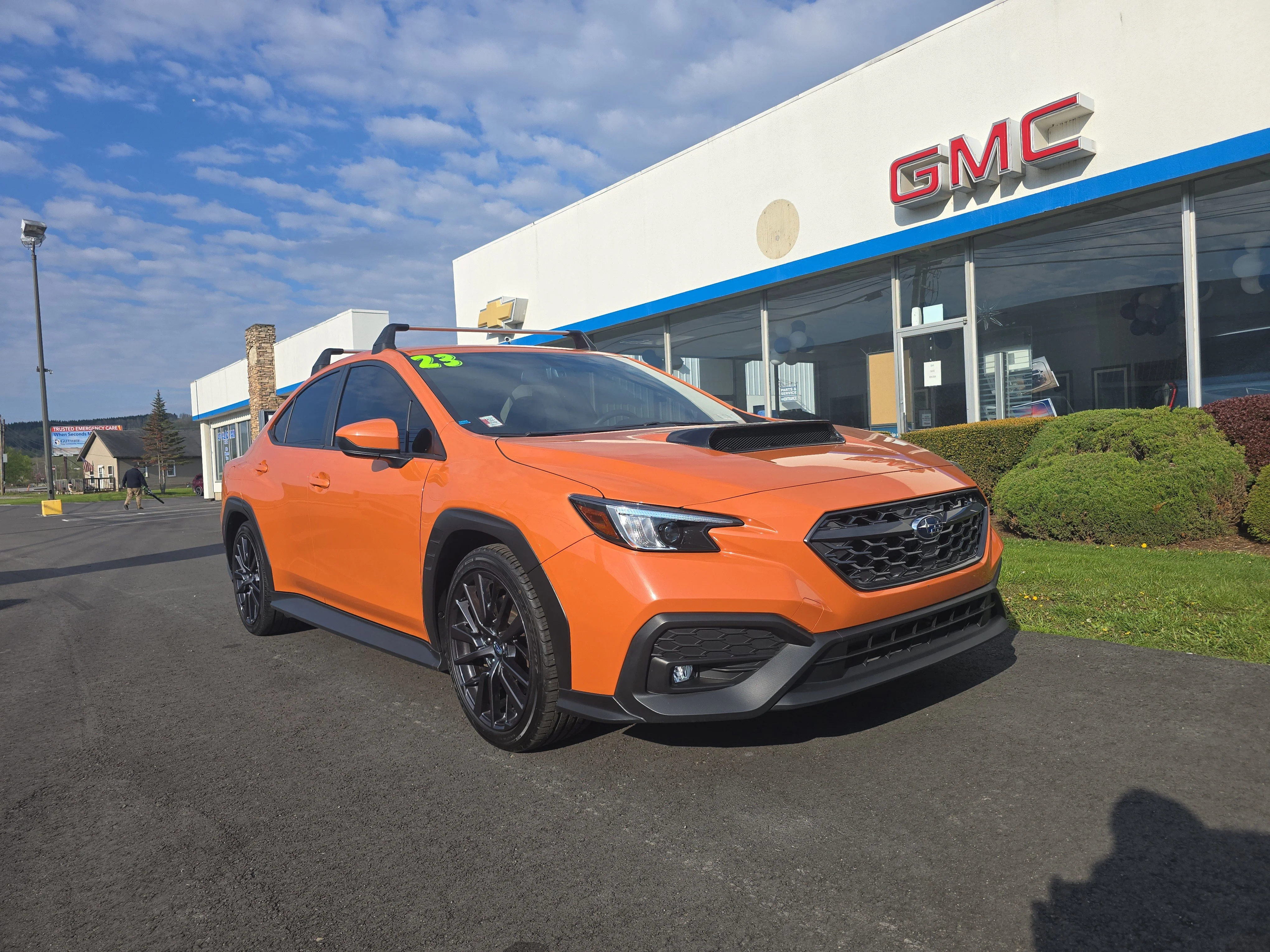 Used 2023 Solar Orange Pearl Subaru Premium image 1